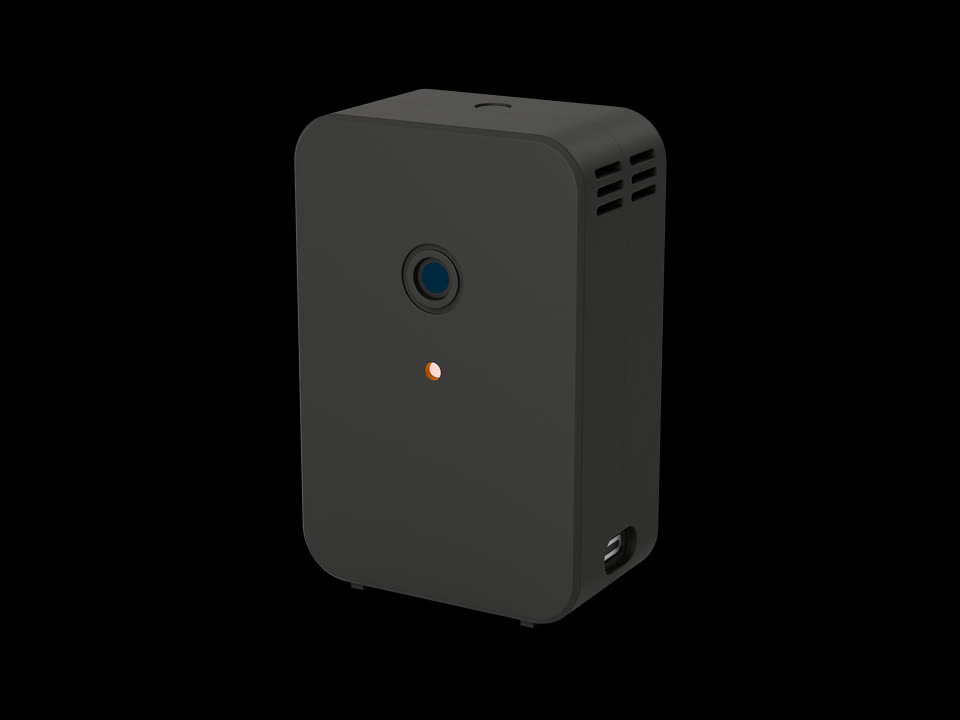 The RISE R-01 printed in Charcoal Black: the same slab with its round camera eye, orange status light and side vents.